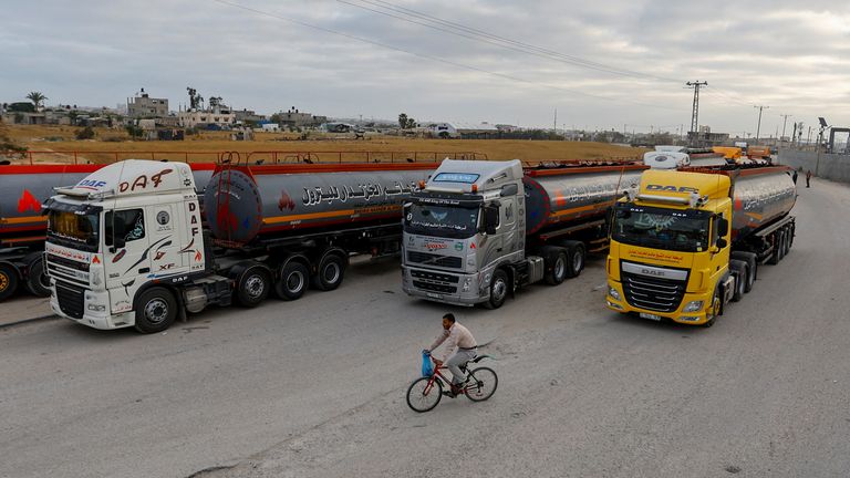 Fuel trucks wait to enter Gaza after the borders were reopened
