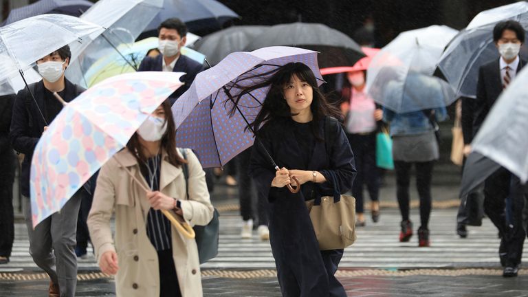 Japan downgrades COVID-19 to a lower-risk category of infectious. Pic: AP

