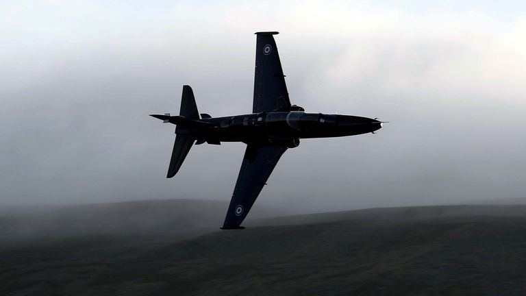 A Hawk jet is seen from Cad West, as it flies low level through the Machynlleth Loop in Wales, a series of valleys notable for their use as low-level training areas for fast jet aircraft. PRESS ASSOCIATION Photo. Picture date: Wednesday November 2, 2016. Photo credit should read: Peter Byrne/PA Wire