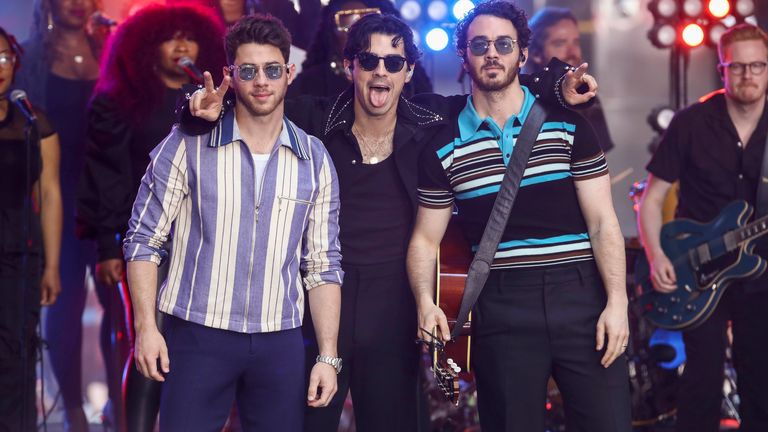 Nick Jonas, from left, Joe Jonas and Kevin Jonas of the Jonas Brothers perform on NBC's Today show.  photo: AP 