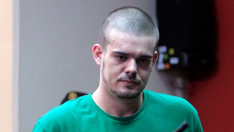 Dutch citizen Joran Van der Sloot walks inside the courtroom during the reading of his verdict, in the Lurigancho prison in Lima January 13, 2012. Van der Sloot was sentenced to 28 years in prison by a Peruvian court on Friday for killing Stephany Flores in Lima in 2010, exactly five years after 18-year-old Alabama native Natalee Holloway disappeared on the island of Aruba after spending time with him. REUTERS/Pilar Olivares (PERU - Tags: CRIME LAW POLITICS)