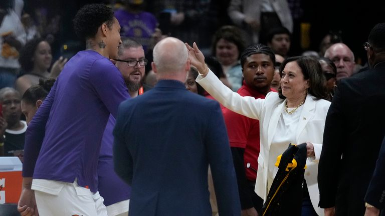 Phoenix Mercury center Brittney Griner (42) is greeted by Vice President Kamala Harris before a WNBA basketball game in Los Angeles
