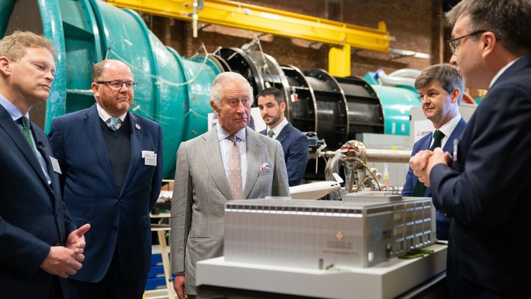 The King views a model of the new laboratory during a visit to the Whittle Laboratory in Cambridge