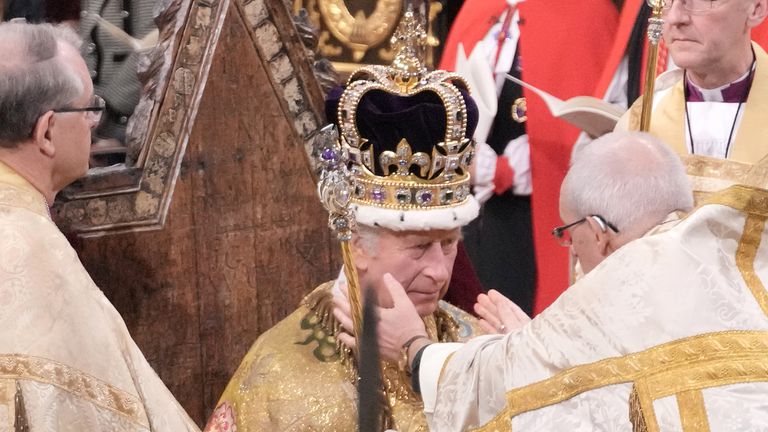 King Charles III receives The St Edward&#39;s Crown during his coronation ceremony in Westminster Abbey, London. Picture date: Saturday May 6, 2023. PA Photo. See PA story ROYAL Coronation. Photo credit should read: Jonathan Brady/PA Wire