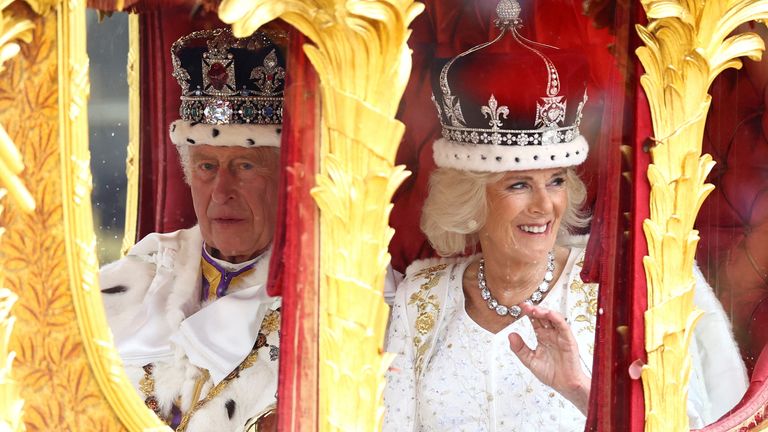 King Charles and Queen Camilla travel from Westminster Abbey in the Gold State Coach, following their coronation ceremony, in London, Britain May 6, 2023. REUTERS/Lisi Niesner TPX IMAGES OF THE DAY
