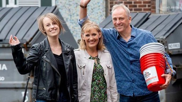 Laura and her parents Nicola and Mark outside Peter Kay's charity gig to raise money for her treatment in 2021