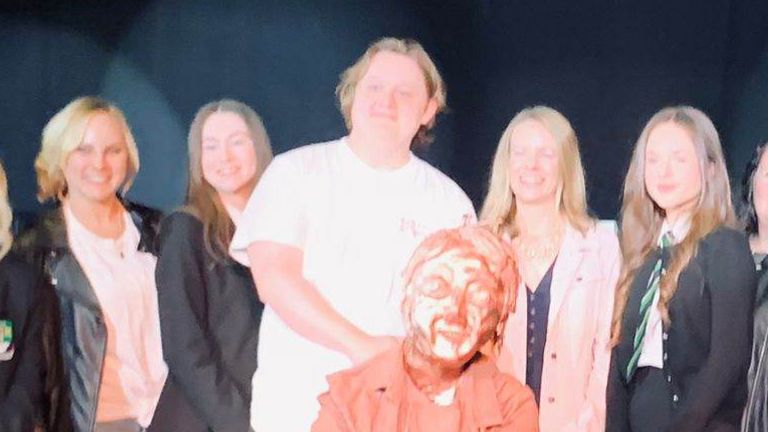 Lewis Capaldi with the statue and students at St Kentigern&#39;s Academy. Pic: Bryan Johnstone