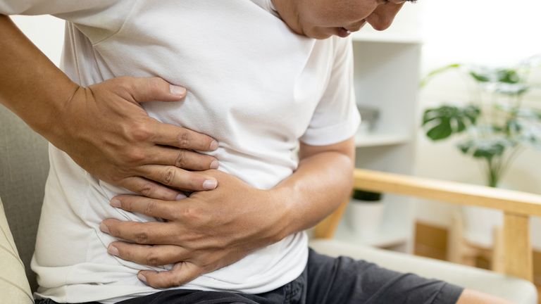 man with stomach pain