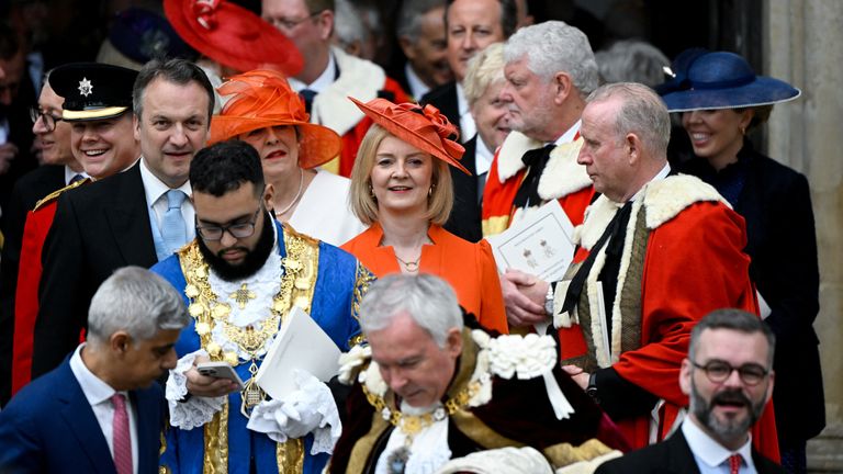 Former British Prime Minister Liz Truss and her husband leave Westminster Abbey following the coronation ceremony of Britain&#39;s King Charles and Queen Camilla, in London, Britain May 6, 2023. REUTERS/Toby Melville/Pool
