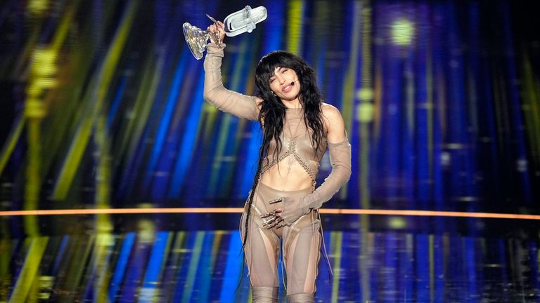 Sweden's Lauren celebrates with the trophy after winning the Eurovision Song Contest grand final in Liverpool, England, Saturday, May 13, 2023. (AP Photo/Martin Meissner)