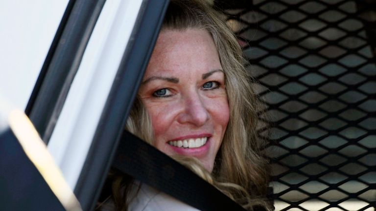 FILE - Lori Vallow Daybell sits in a police car after a hearing at the Fremont County Courthouse in St. Anthony, Idaho, on Aug. 16, 2022. The sister of Tammy Daybell, who was killed in what prosecutors say was a doomsday-focused plot, told jurors Friday, April 28, 2023, that her sister&#39;s funeral was held so quickly that some family members couldn&#39;t attend. The testimony came in the triple murder trial of Vallow Daybell, who is accused along with Chad Daybell in Tammy&#39;s death and the deaths of Vallow Daybell&#39;s two youngest children. (Tony Blakeslee/East Idaho News via AP, Pool, File)