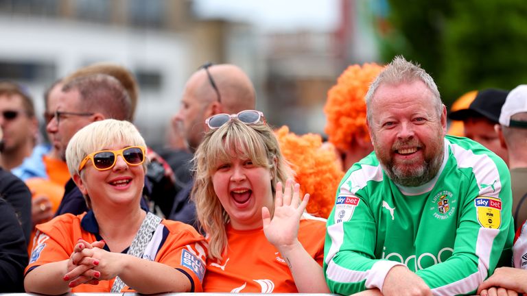 Luton Town fans in St George&#39;s Square ahead of on an open top bus parade in Luton to celebrate their promotion 