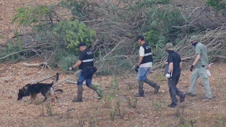 Personnel at Barragem do Arade reservoir, in the Algave, Portugal, as searches continue as part of the investigation into the disappearance of Madeleine McCann. The area is around 50km from Praia da Luz where Madeleine went missing in 2007. Picture date: Wednesday May 24, 2023. PA Photo. See PA story POLICE Portugal. Photo credit should read: Yui Mok/PA Wire 