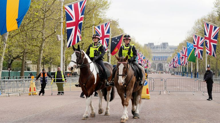 Police officers on horses patrol ahead of King Charles&#39; coronation at the Mall,  
