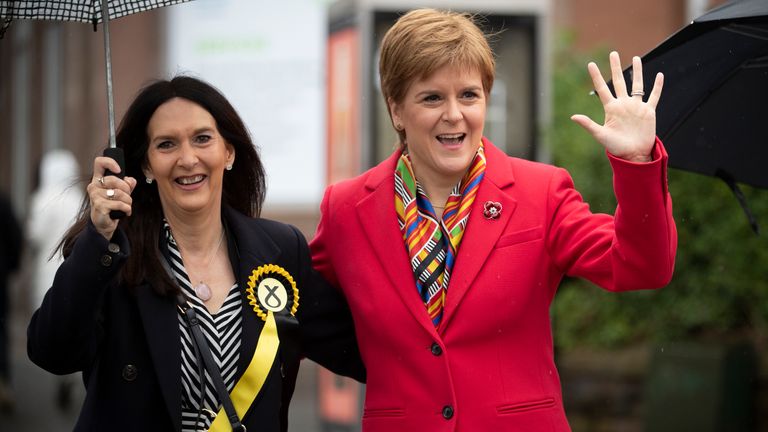 SNP leader Nicola Sturgeon (right) with Margaret Ferrier, SNP candidate for Rutherglen, during her visit to Burnside Pharmacy in Rutherglen, Glasgow, meeting voters and activists while on the General Election campaign.