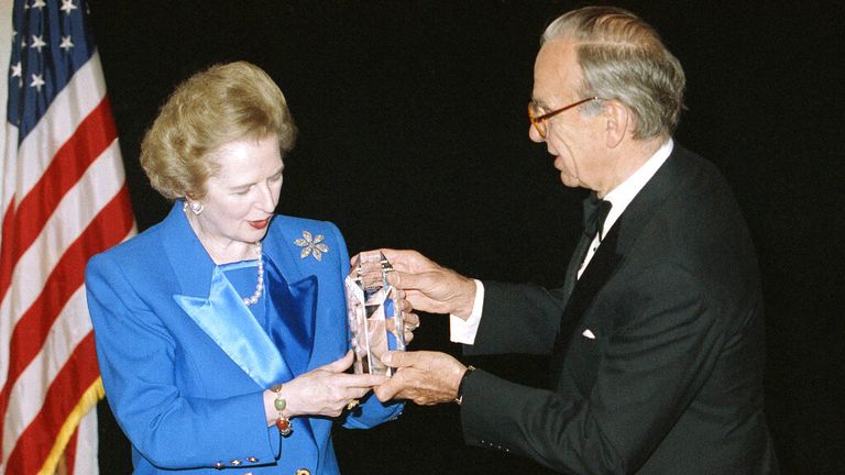 Murdoch presenting former prime minister Margaret Thatcher with a humanitarian award in 1991 Pic: AP 
