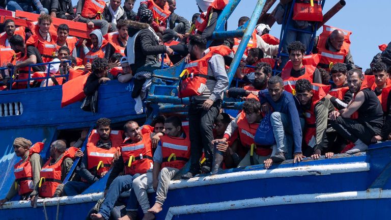 The fishing vessel with over 600 migrants on board, is bursting at the seams as every little space on board is occupied by a human body.