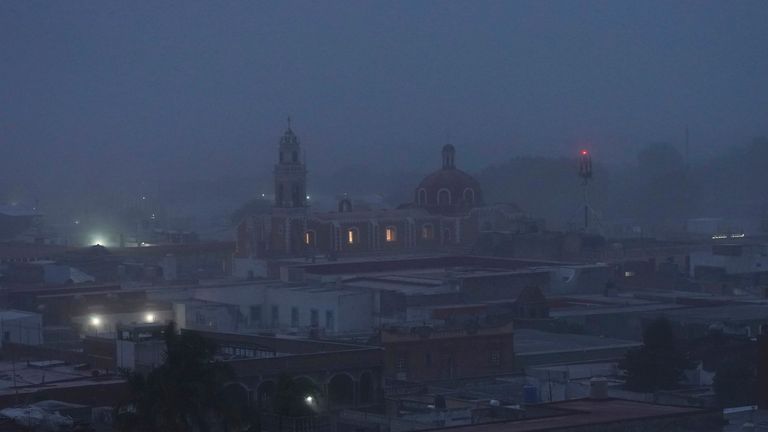 Volcanic ash from the Popocatépetl volcano blankets the Mexican city of Atlixco.  Peak AP