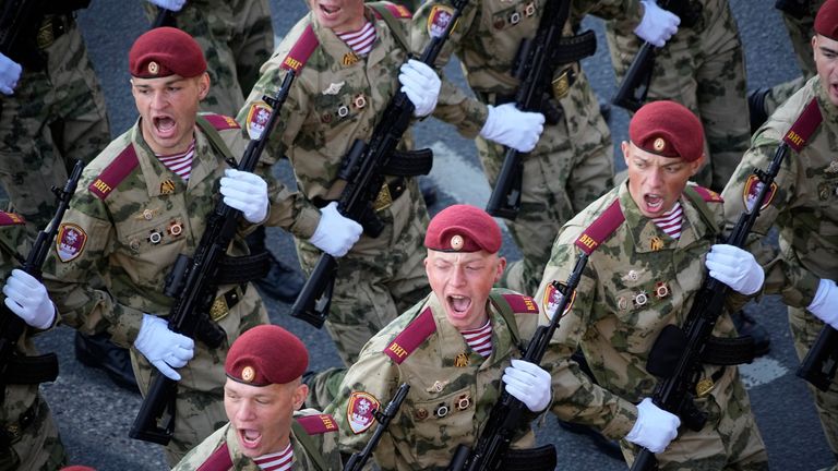 Russian soldiers march towards Red Square to watch a Victory Day military parade in Moscow, Russia, Tuesday, May 9, 2023, marking the 78th anniversary of the end of World War II.  (AP Photo/Alexander Zemlianichenko)