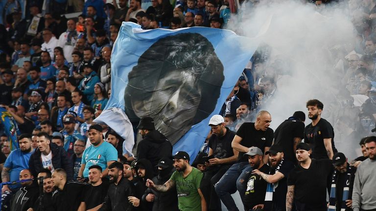 Napoli fans with a Diego Maradona flag 