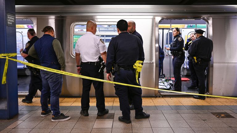 Police officers at the scene. Pic: AP