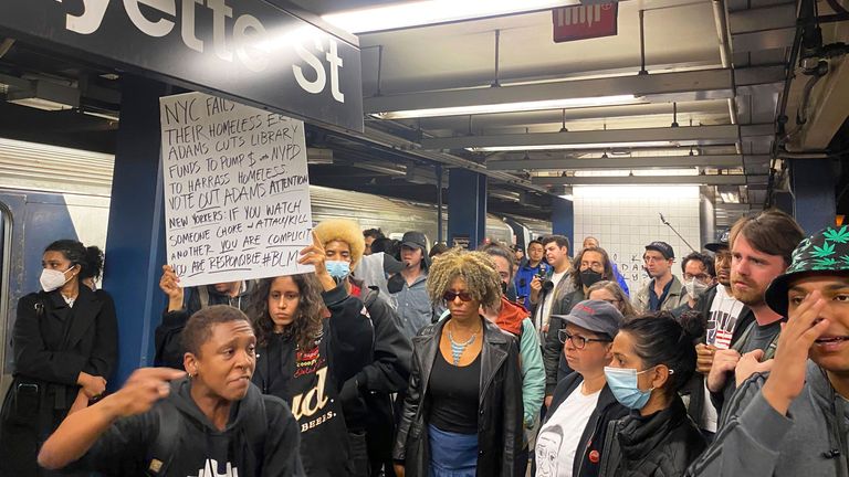 Protesters march through the Broadway-Lafayette subway station. Pic: AP