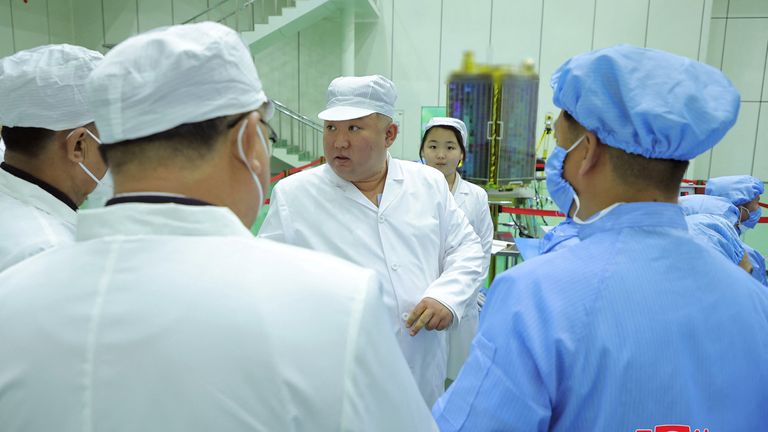 North Korean leader Kim Jong Un and his daughter Kim Ju Ae meet with members of the Non-permanent Satellite Launch Preparatory Committee, as he inspects the country&#39;s first military reconnaissance satellite, in Pyongyang, North Korea