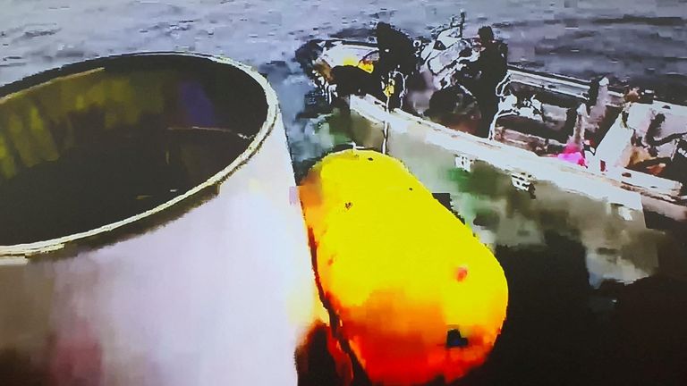 A handout picture shows what is believed to be a part of a space launch vehicle that North Korea said crashed into the sea off the west coast of the divided peninsula, South Korea, 