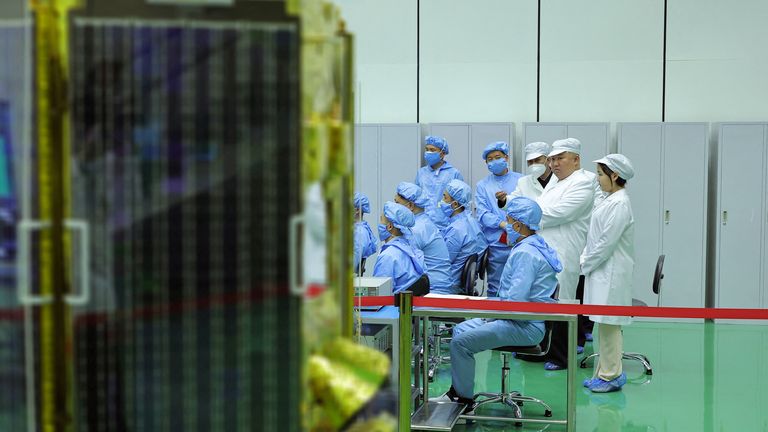 North Korean leader Kim Jong Un and his daughter Kim Ju Ae meet with members of the Non-permanent Satellite Launch Preparatory Committee, as he inspects the country&#39;s first military reconnaissance satellite, in Pyongyang, North Korea