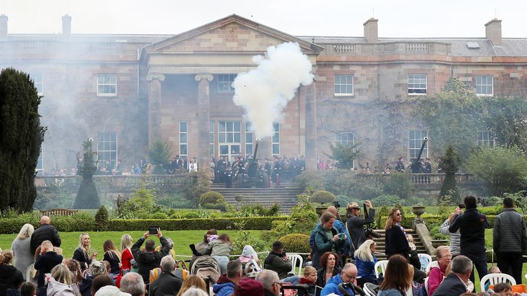 A shot is fired by members of the 206 (Ulster) Battery Royal Artillery at Royal Hillsborough Castle and Gardens as part of King Charles and Queen Camilla&#39;s coronation, in Hillsborough, Northern Ireland May 6, 2023. REUTERS/Damien Storan