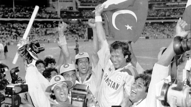Khan, clutching his country&#39;s flag, celebrates his 1992 World Cup success. Pic: AP