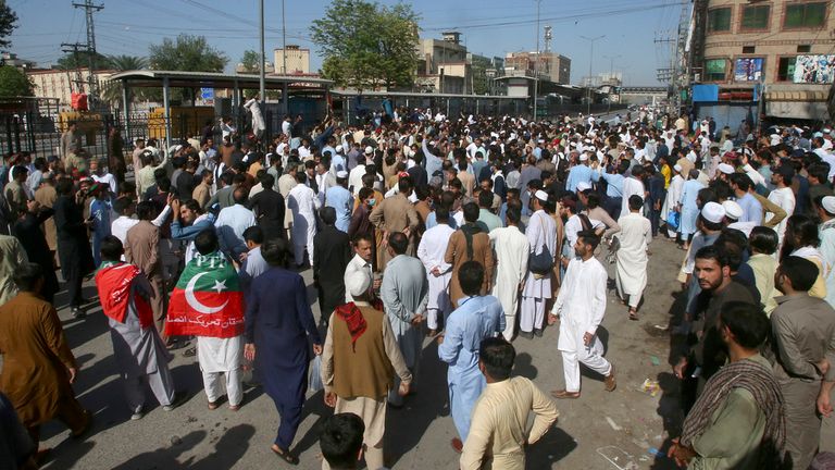 Supporters of Pakistan&#39;s former Prime Minister Imran Khan block a road as a protest to condemn the arrest of their leader, in Peshawar, Pakistan, Tuesday, May 9, 2023. Pakistan&#39;s anti-graft agents on Tuesday arrested former Prime Minister Khan as he appeared in a court in the capital, Islamabad, to face charges in multiple graft cases, police and officials from his party said. (AP Photo/Muhammad Sajjad)