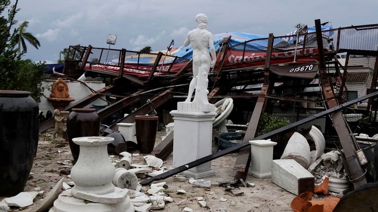 Damaged pottery is seen after a tornado hit the area Sunday