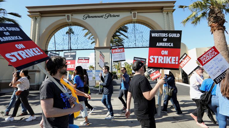 Workers and supporters of the Writers Guild of America protest at a picket line outside Paramount Studios after union negotiators called a strike for film and television writers in Los Angeles, California, U.S., May 2, 2023. REUTERS/Aude Guerrucci

