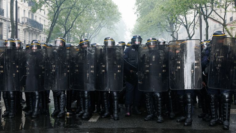 French CRS riot police stand guard during the traditional May Day labour march, a day of mobilisation against the French pension reform law and for social justice, in Paris, France May 1, 2023. REUTERS/Benoit Tessier
