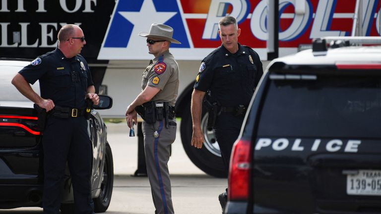 Officers with the Allen Police Department man the mobile command post the day after a gunman shot multiple people at the Dallas-area Allen Premium Outlets mall in Allen, Texas, U.S. May 7, 2023. REUTERS/Jeremy Lock
