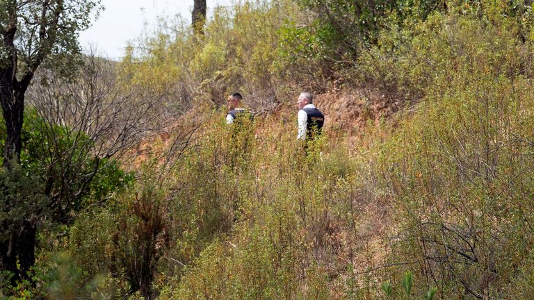 Officers of Portugal&#39;s investigative Judicial Police are seen at the site of a remote reservoir where a new search for the body of Madeleine McCann is set to take place, in Silves, Portugal, in this screen grab from a video, May 22, 2023. REUTERS/Luis Ferreira
