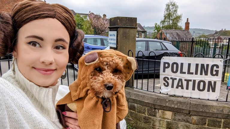Helen Jakes dressed as Princess Leia with her poodle cross Pekoe in an Ewok outfit at a polling station in Batley, West Yorkshire. 