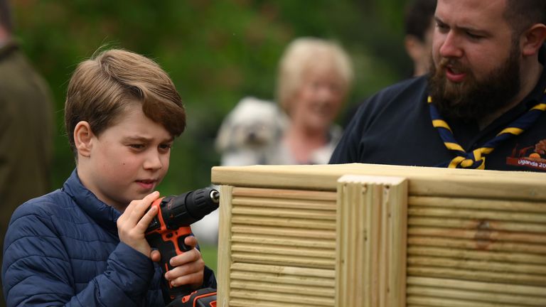 Prince George joins volunteers to help renovate and improve the 3rd Upton Scouts Hut in Slough, as part of the Big Help Out, to mark the crowning of King Charles III and Queen Camilla. Picture date: Monday May 8, 2023.