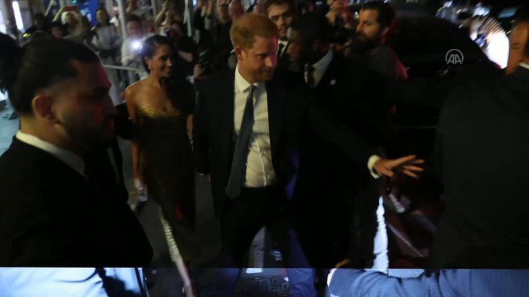 Prince Harry and Meghan leave their prizes before the car chase