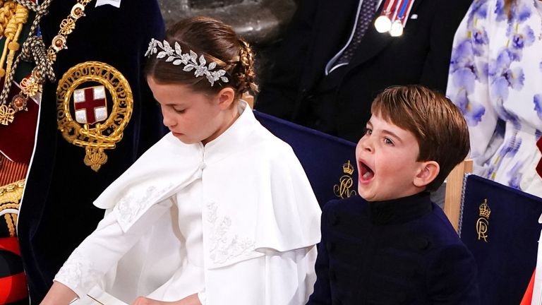 Prince Louis gives a yawn, as he sits with the Prince of Wales, Princess Charlotte, Prince Louis, the Princess of Wales and the Duke of Edinburgh at the coronation ceremony of King Charles III and Queen Camilla in Westminster Abbey, London. Picture date: Saturday May 6, 2023. Yui Mok/Pool via REUTERS
