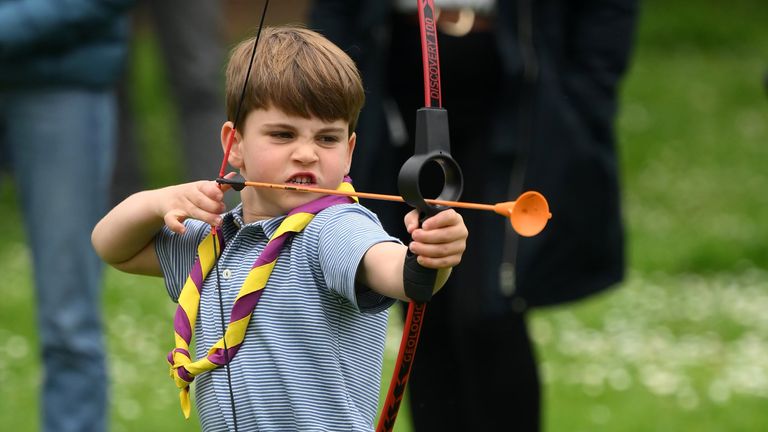 Prince Louis tries archery while joining volunteers to help renovate and improve the 3rd Upton Scouts Hut in Slough, as part of the Big Help Out, to mark the crowning of King Charles III and Queen Camilla. Picture date: Monday May 8, 2023.