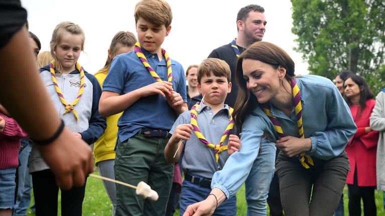 Prince George, Prince Louis and the Princess of Wales toast marshmallows as they join volunteers to help renovate and improve the 3rd Upton Scouts Hut in Slough, as part of the Big Help Out, to mark the crowning of King Charles III and Queen Camilla. Picture date: Monday May 8, 2023.