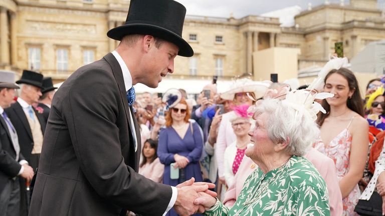 The Prince of Wales meets Dame Elizabeth Watts, who is 93 years old, during a Garden Party at Buckingham Palace, London, in celebration of the coronation. Picture date: Tuesday May 9, 2023. Jonathan Brady/Pool via REUTERS
