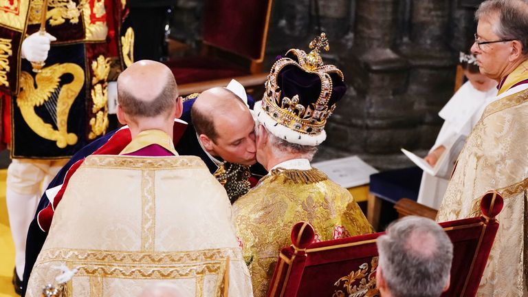 The Prince of Wales kisses his father King Charles III during his coronation ceremony in Westminster Abbey, London. Picture date: Saturday May 6, 2023. PA Photo. See PA story ROYAL Coronation. Photo credit should read: Yui Mok/PA Wire