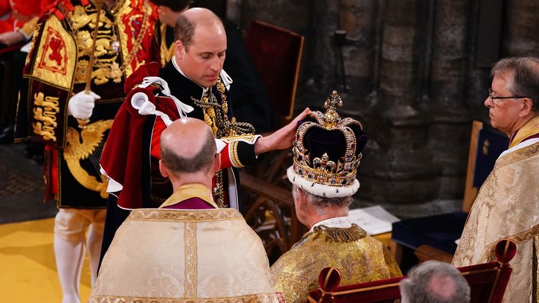 The Prince of Wales touches St Edward&#39;s Crown on King Charles III&#39;s head during his coronation ceremony in Westminster Abbey, London. Picture date: Saturday May 6, 2023.