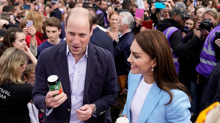 The Prince of Wales, who is holding a can of &#39;Return of the King&#39; Coronation Ale, and the Princess of Wales during a walkabout meeting members of the public on the Long Walk near Windsor Castle, Berkshire, where the Coronation Concert to celebrate the coronation of King Charles III and Queen Camilla is being held. Picture date: Sunday May 7, 2023. Andrew Matthews/Pool via REUTERS