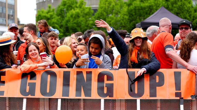 Luton Town fans in St George&#39;s Square ahead of on an open top bus parade in Luton to celebrate their promotion 