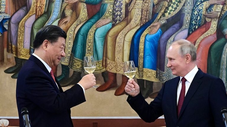 Vladimir Putin and Xi Jinping share a toast during a dinner at the Kremlin in March Pic: AP 
