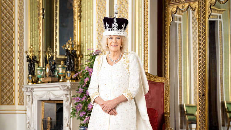 Queen Camilla is pictured in The Green Drawing Room of Buckingham Palace, London. The Queen is wearing Queen Mary&#39;s Crown and Robe of Estate